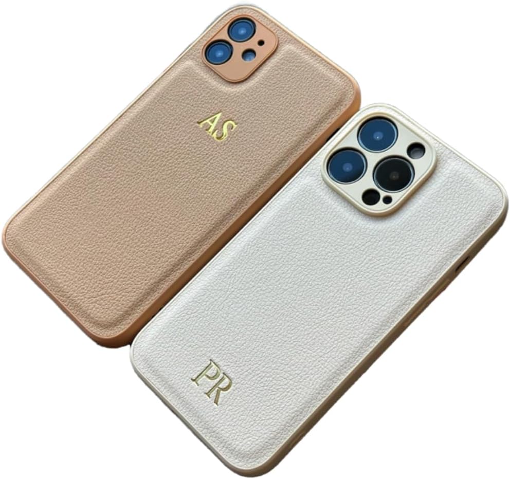 Two smartphones in textured cases, one tan with "AS" initials and one white with "PR" initials, both featuring gold lettering and prominent camera lenses.