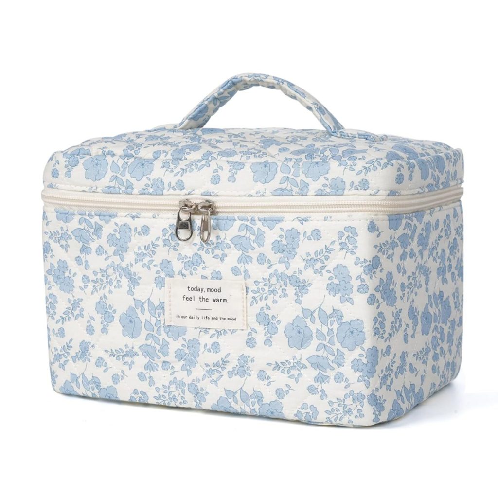 Rectangular fabric cosmetic bag with a blue floral pattern, a zipper closure, a handle on top, and a small label on the front&mdash;perfect for Mother's Day Gifts found on Amazon.