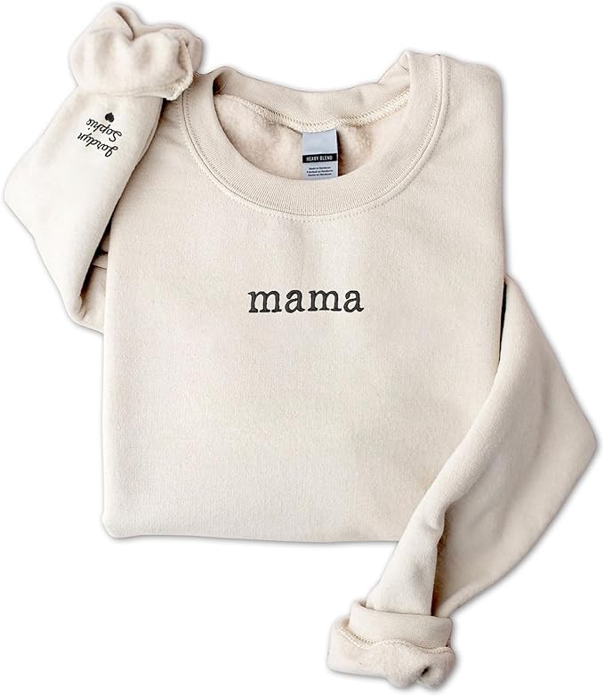 A cream-colored sweatshirt with "mama" printed in lowercase on the front and &ldquo;stadium sleeve&rdquo; text hidden inside&mdash;an ideal pick for Mother's Day Gifts Amazon shoppers will love.
