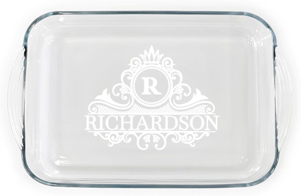 A clear glass baking dish with ornate white etching featuring the letter "R" and the name "Richardson" in decorative lettering.