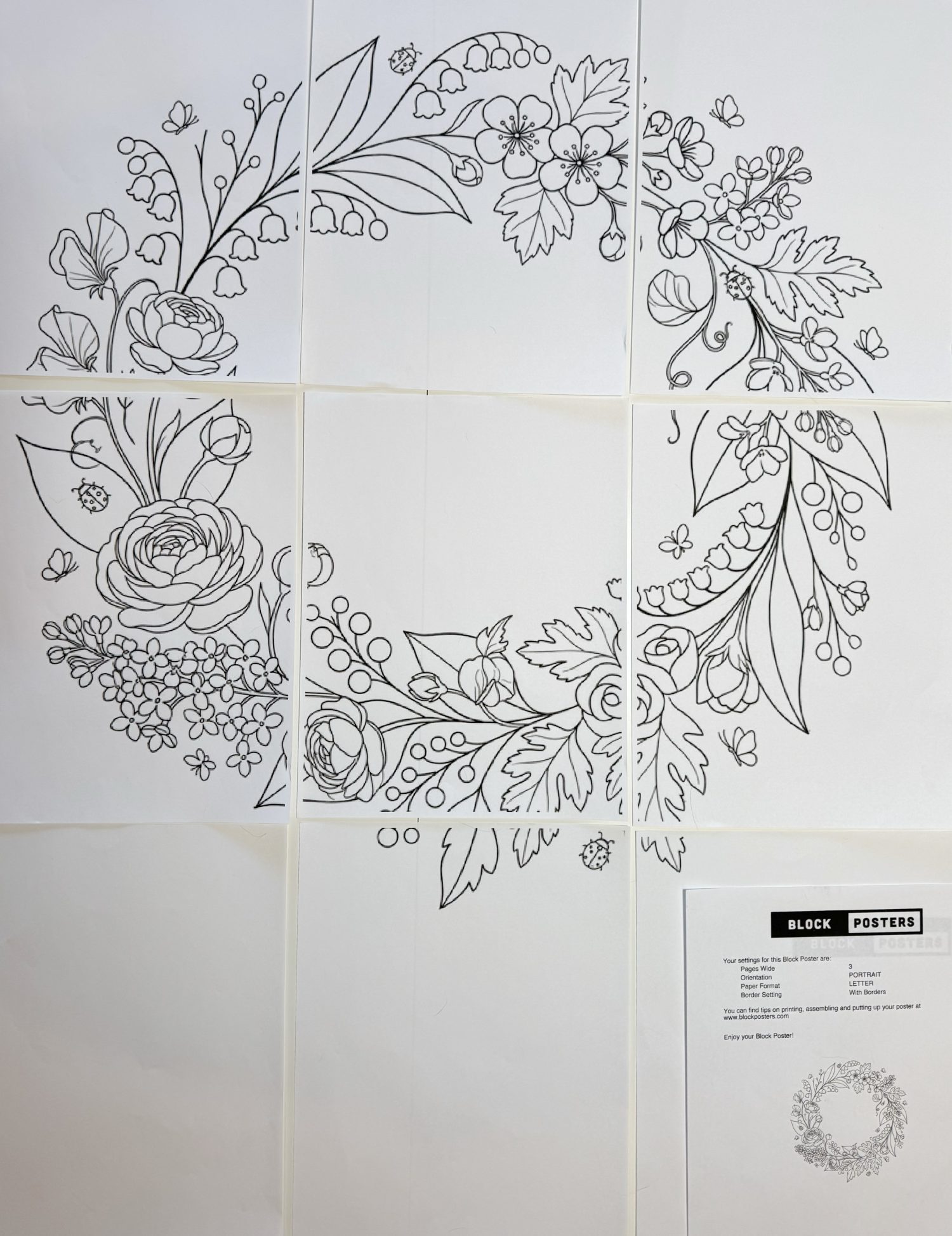 A black and white floral wreath outline printed on six sheets of paper, arranged in a grid. An instruction sheet labeled "Block Posters" is in the bottom right corner.