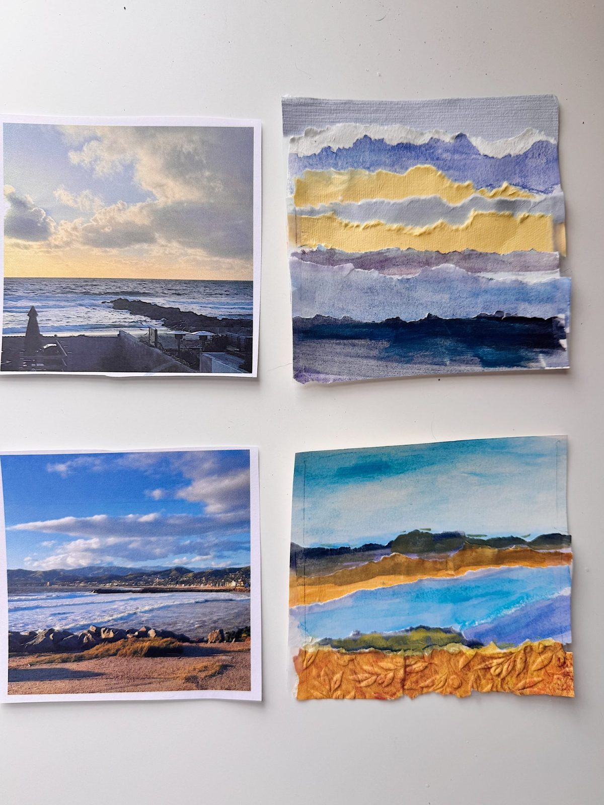 Two printed landscape photos are paired with their corresponding mixed media art interpretations, each set displayed side by side on a white surface.