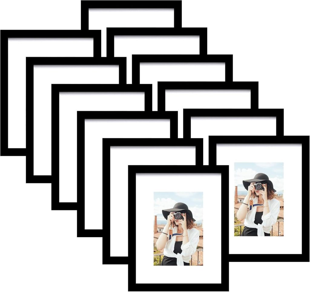 A set of eight black photo frames, two featuring a photo of Theo of Golden Book Club wearing a hat and using a camera outdoors.