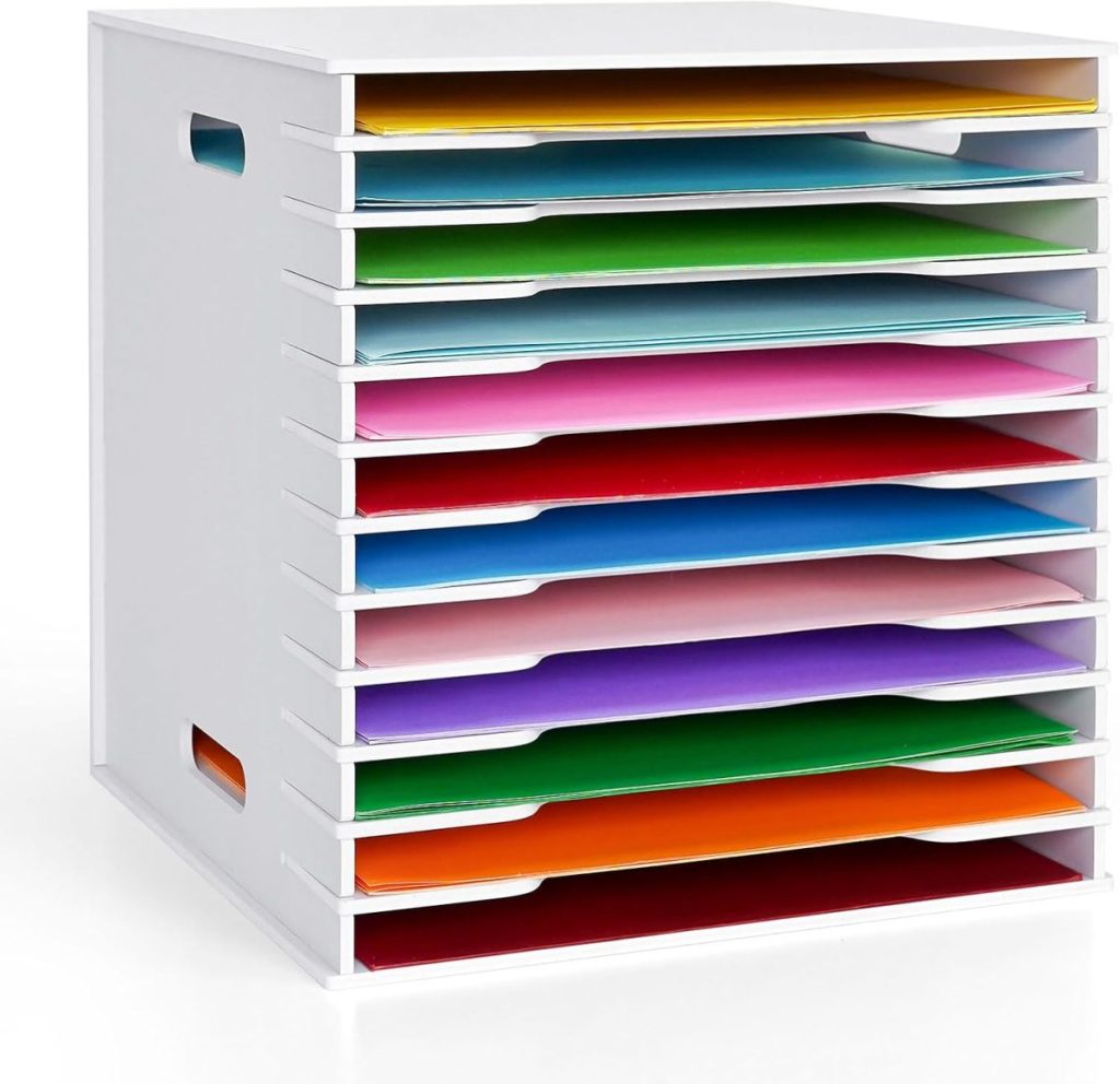 A white paper organizer with twelve horizontal slots, each holding different colored sheets of paper, arranged in a neat stack.