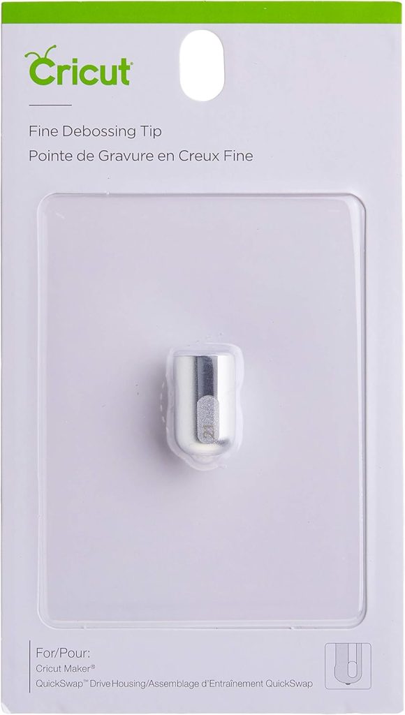 Cricut Fine Debossing Tip in silver color, packaged and displayed in clear plastic and white cardboard backing.