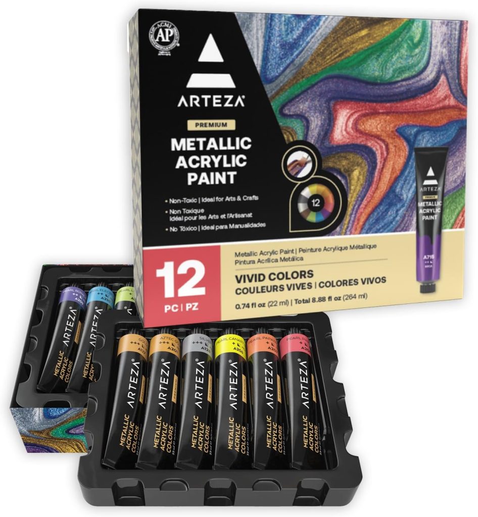 Box of Arteza Premium Metallic Acrylic Paint with 12 tubes in assorted colors, displayed in a black plastic tray in front of the packaging.
