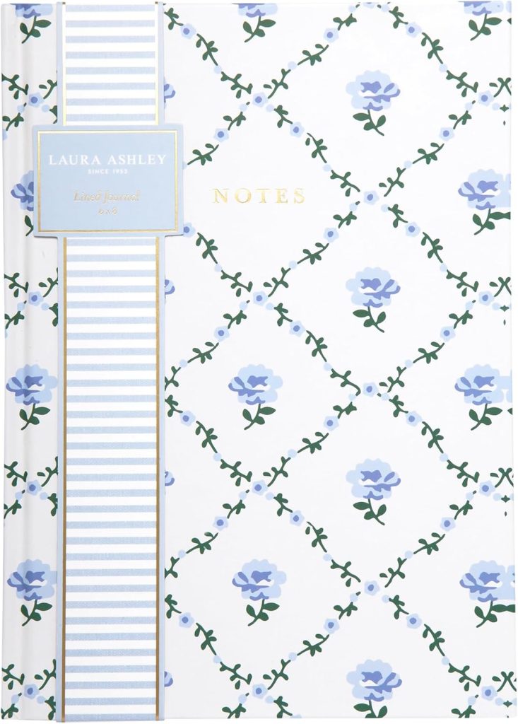 Lined journal with a white cover featuring a blue floral pattern, gold text reading "NOTES," and a label indicating "Laura Ashley Lined Journal"&mdash;perfect for pairing with wax seals for an extra touch of elegance.