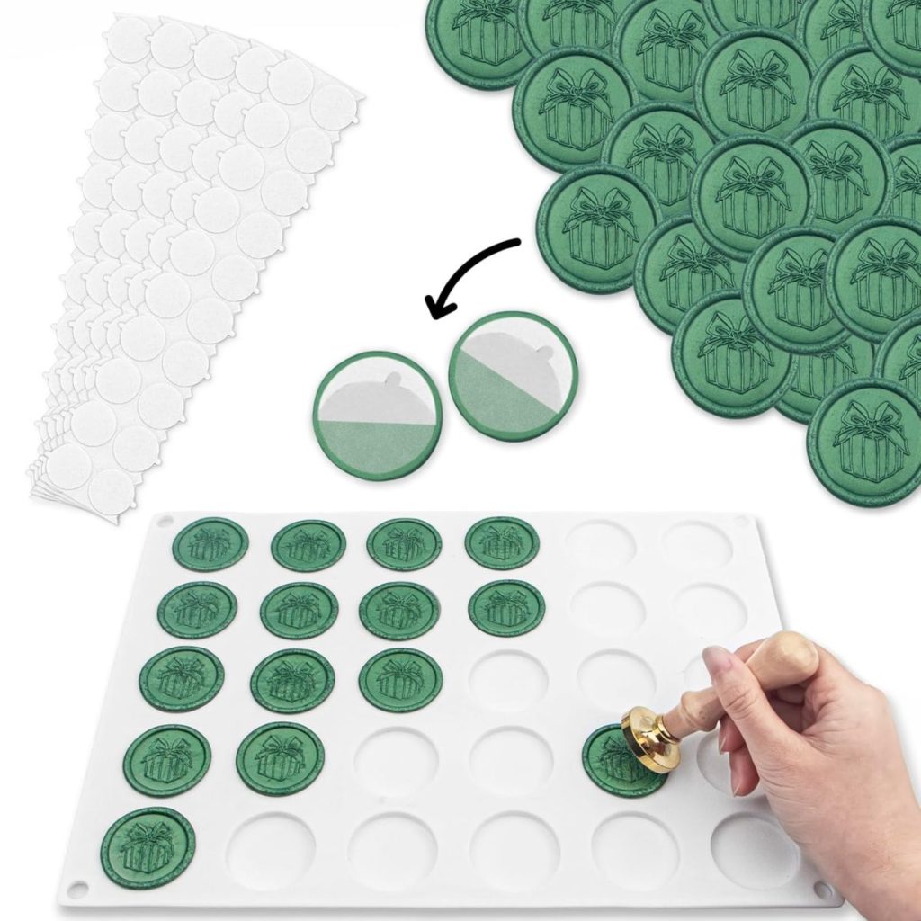 A hand uses a stamp to create green wax seals with a present design on a mold tray; adhesive stickers and finished wax seals are also displayed.