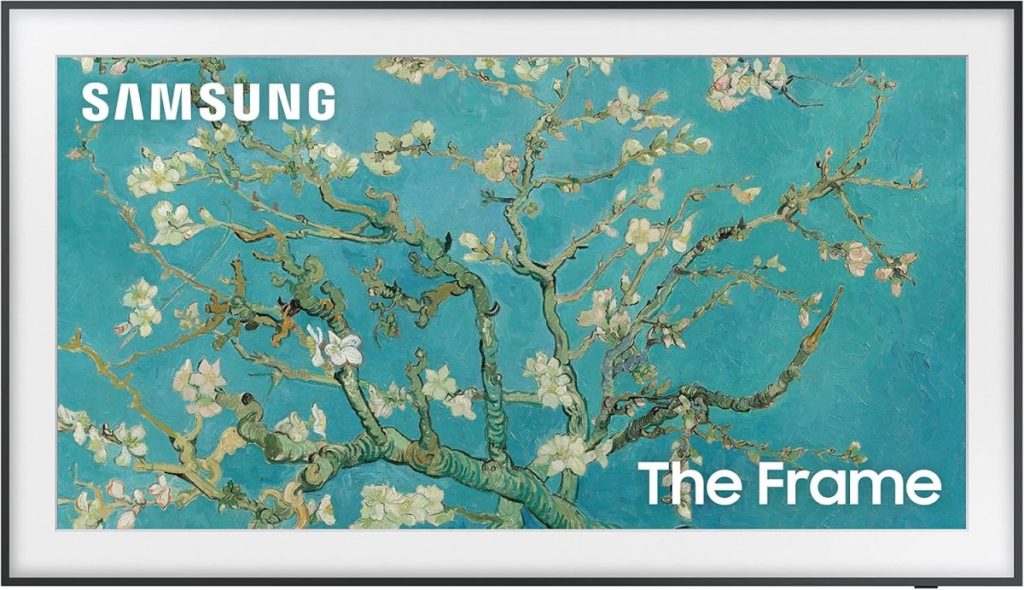 A Samsung The Frame TV displays Van Gogh's "Almond Blossom" painting, with a white beveled frame and logos in the top left and bottom right corners&mdash;just the kind of masterpiece Theo of Golden Book Club would admire.