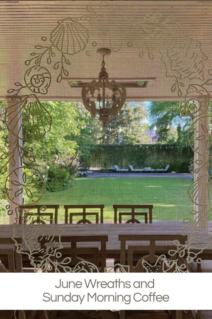 View from a covered porch with a chandelier, looking out to a garden and lawn chairs, with floral wreath designs on the screen and the caption &ldquo;June Wreaths and Sunday Morning Coffee.&rdquo;.