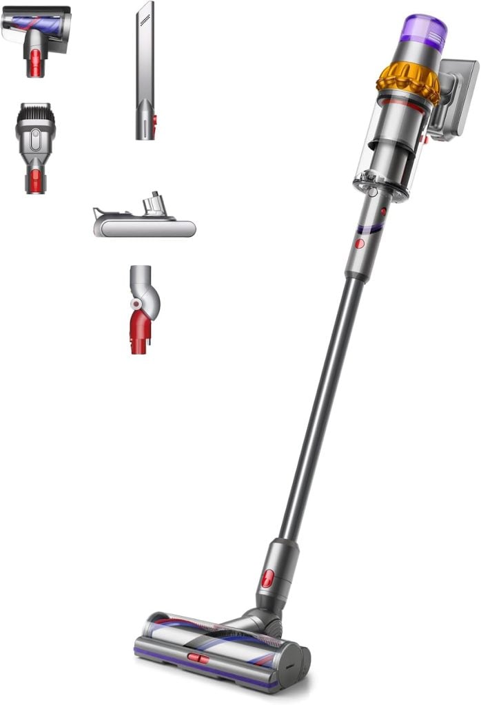 Cordless stick vacuum cleaner with gold and purple accents, shown with four interchangeable attachments on a white background.