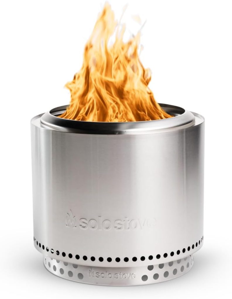 A stainless steel Solo Stove fire pit with visible flames rising from the top, set against a white background&mdash;an ideal Amazon Father's Day gift for outdoor enthusiasts.