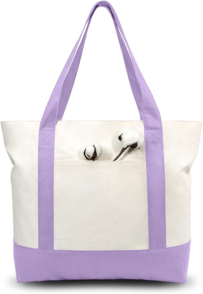 A canvas tote bag with lavender handles and base, featuring two cotton bolls on the front pocket and adorned with cute polymer clay charms for a playful touch.