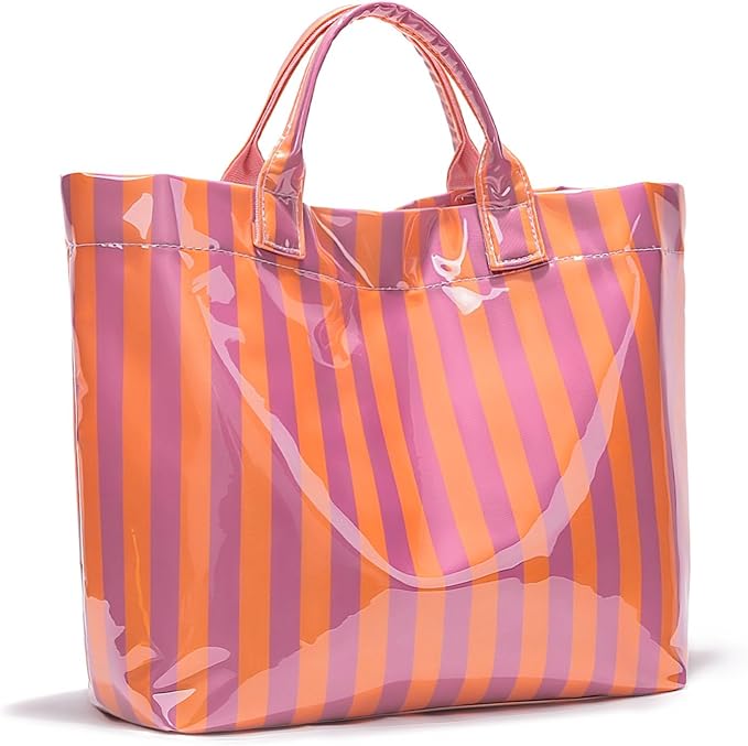 A glossy tote bag with vertical pink and orange stripes and two short handles, standing upright against a white background.