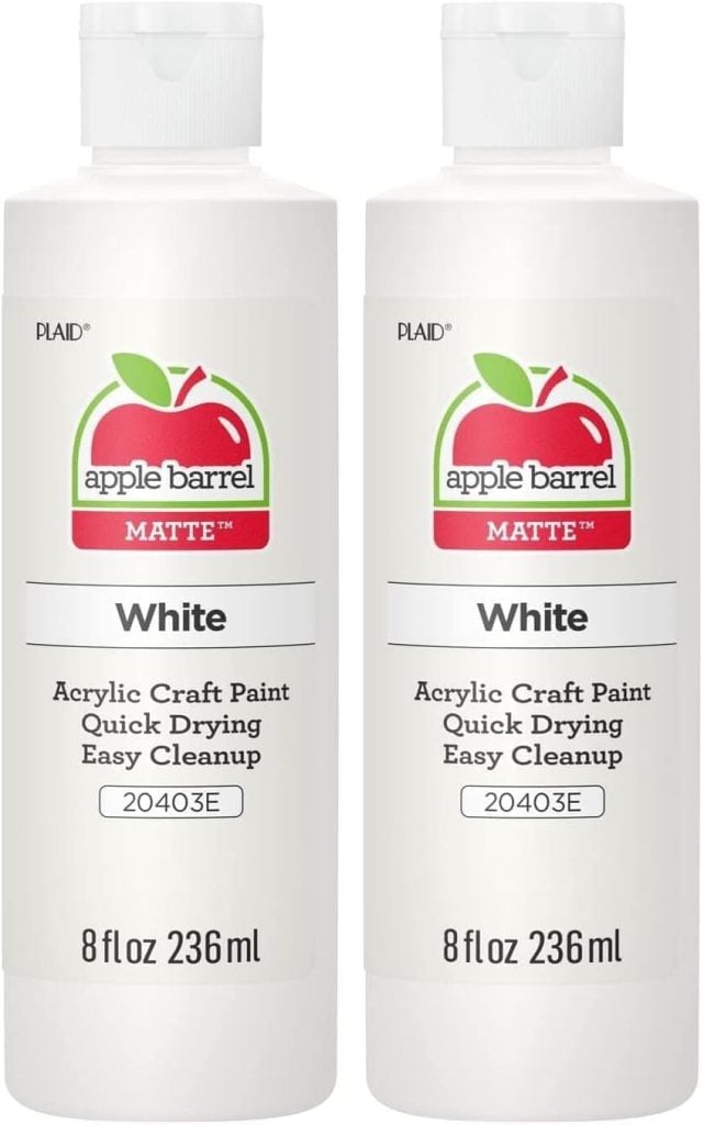 Two bottles of Apple Barrel matte white acrylic craft paint, each 8 fl oz (236 ml), with labels indicating quick drying and easy cleanup.