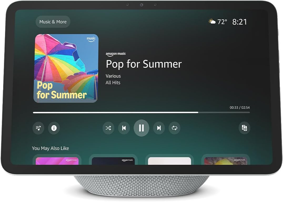 A smart display shows an Amazon Music screen playing "Pop for Summer," with album art of a colorful umbrella and playback controls visible. The time is 8:21 and the temperature is 72°F.