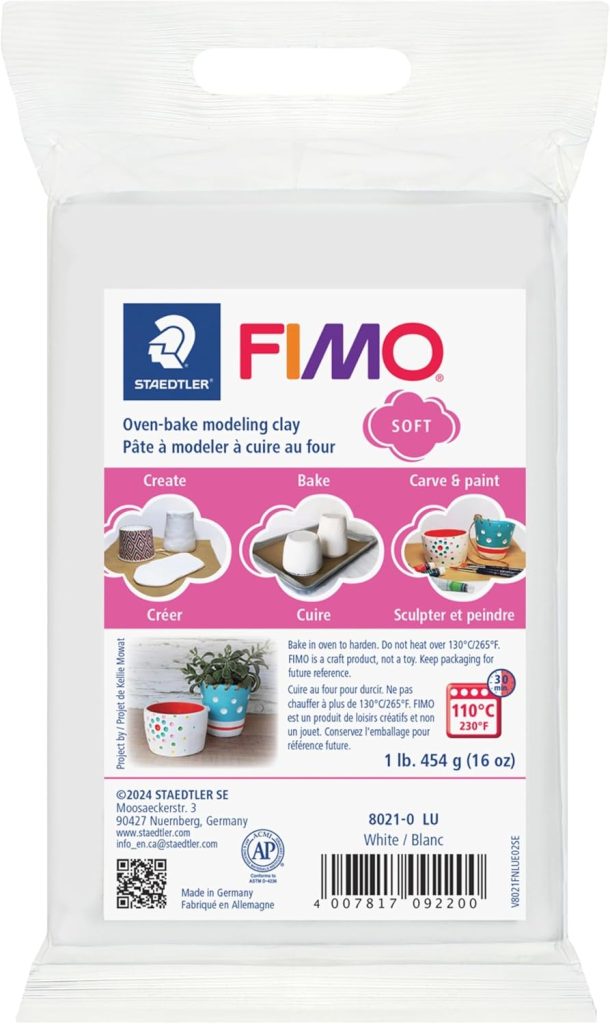 A package of Staedtler FIMO Soft white oven-bake modeling clay, 454g, showing product details and usage instructions in English and French&mdash;ideal for crafting unique polymer clay charms.