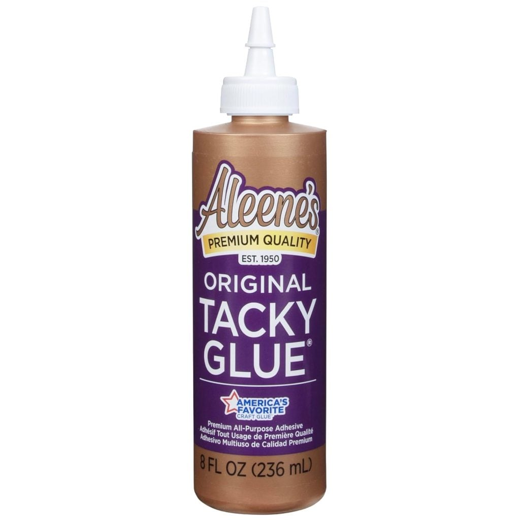 A bottle of Aleene's Original Tacky Glue, 8 fl oz (236 mL), with a white pointed cap and a brown and purple label.