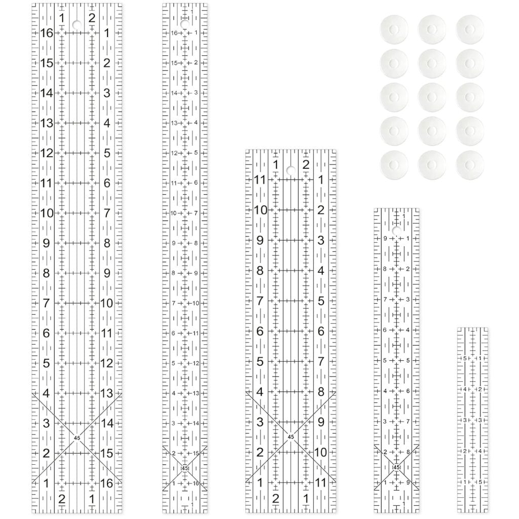 Set of six clear quilting rulers in various sizes with marked measurements, plus sixteen white circular grips arranged in a grid in the top right corner.