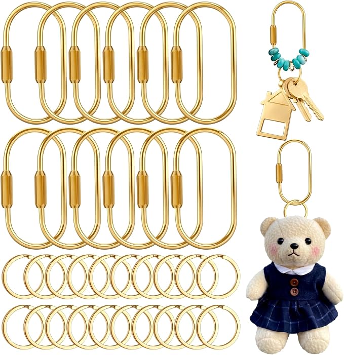A set of gold oval key rings in various sizes, with examples showing a set of keys, a teddy bear keychain, and colorful polymer clay charms attached to the rings.