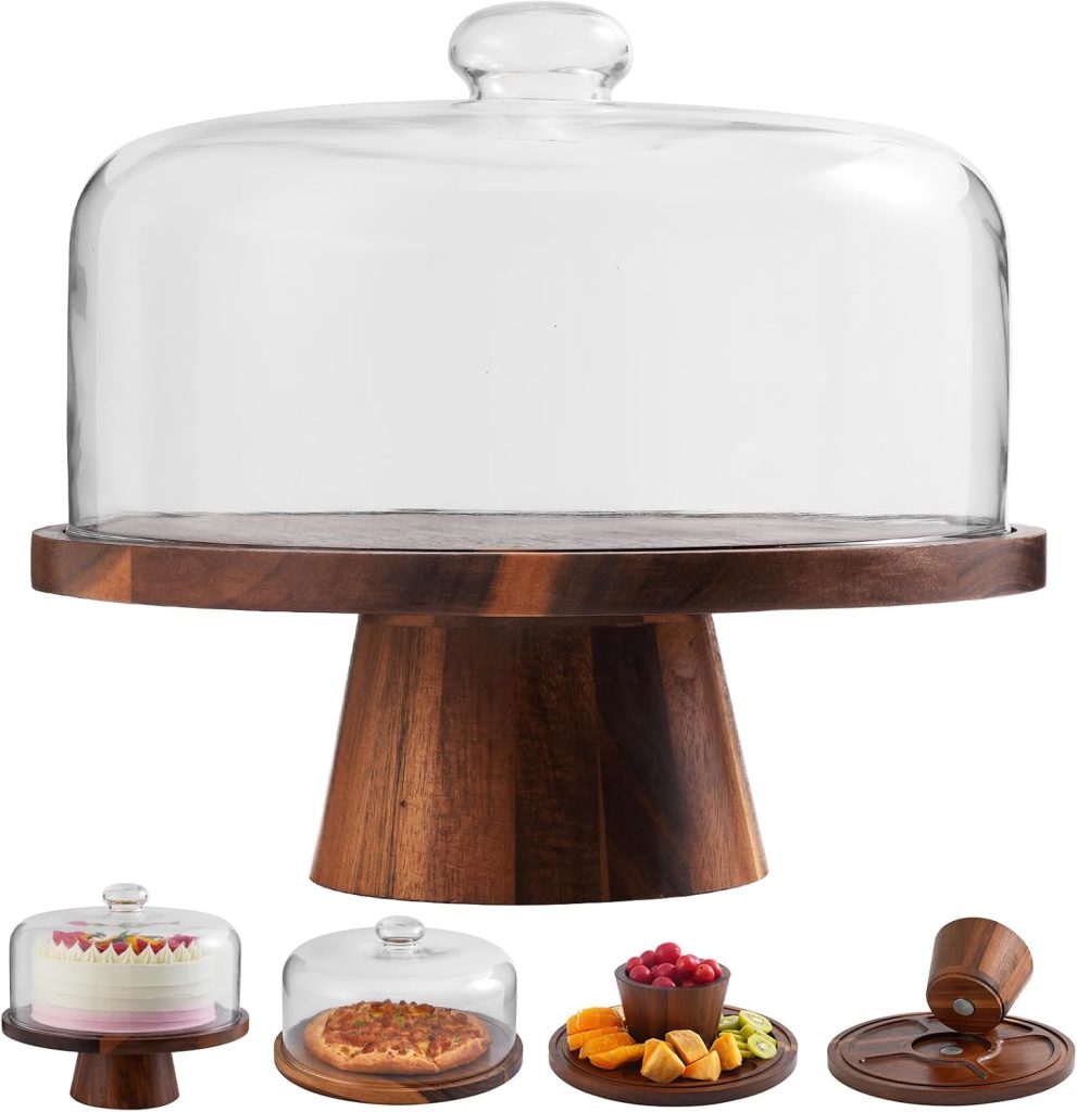 A wooden cake stand with a clear glass dome cover, shown with examples holding a cake, pie, fruits, and even used as a snack tray with nuts or to elegantly present a grilled peach salad.