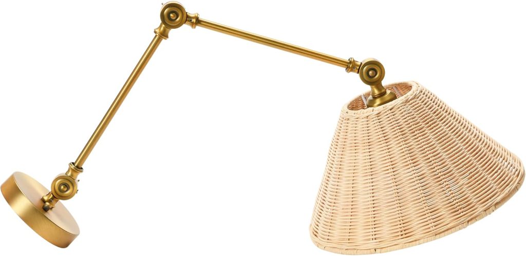 Adjustable brass wall lamp with a woven rattan lampshade, reminiscent of classic rattan furniture, shown against a white background, arm extended horizontally to the left.