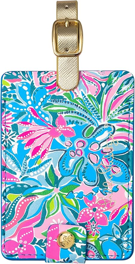 Floral-patterned luggage tag with pink, blue, and green design, gold buckle, and a small gold emblem at the bottom.