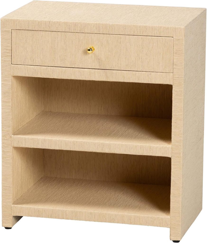 Light wood nightstand with one drawer featuring a small gold knob and two open shelves below, inspired by the airy elegance of rattan furniture, shown on a white background.