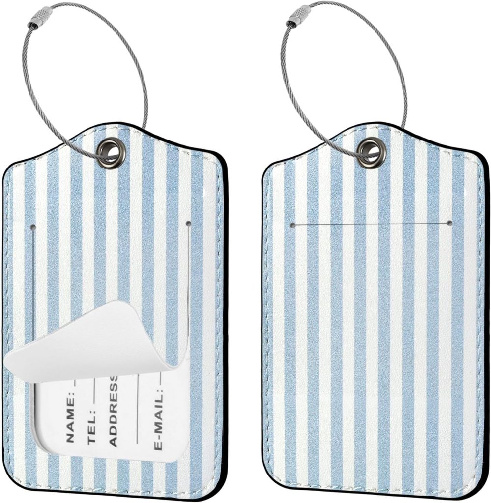 Two blue and white striped luggage tags are shown, one displaying a flap revealing a contact information card and the other showing the reverse side without visible information.