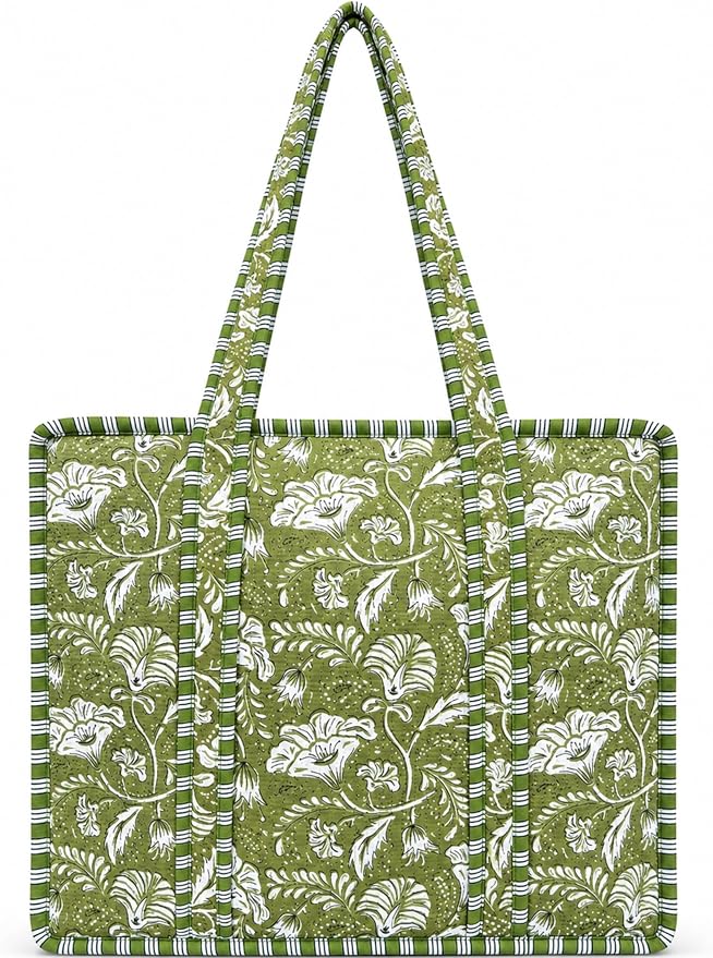 Green quilted tote bag with white floral pattern and long handles, featuring vertical striped accents along the edges and handles.