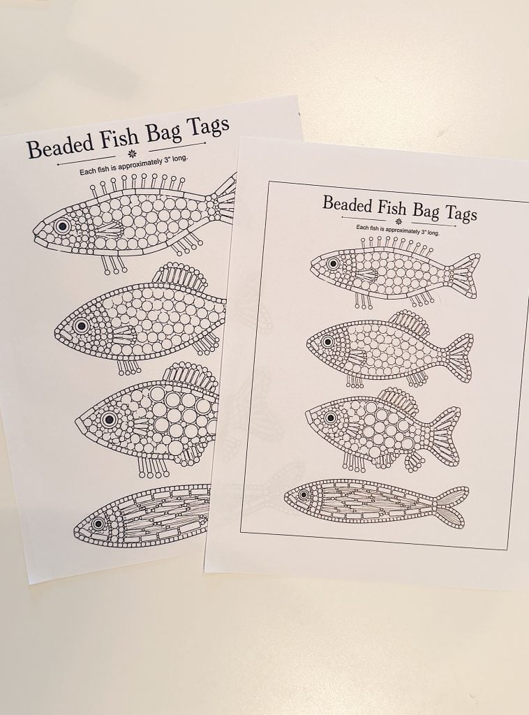 Two printed sheets titled "Beaded Fish Bag Tags," each showing four outlined fish designs with spaces for beads, intended for a craft activity. Sheets are on a light surface.